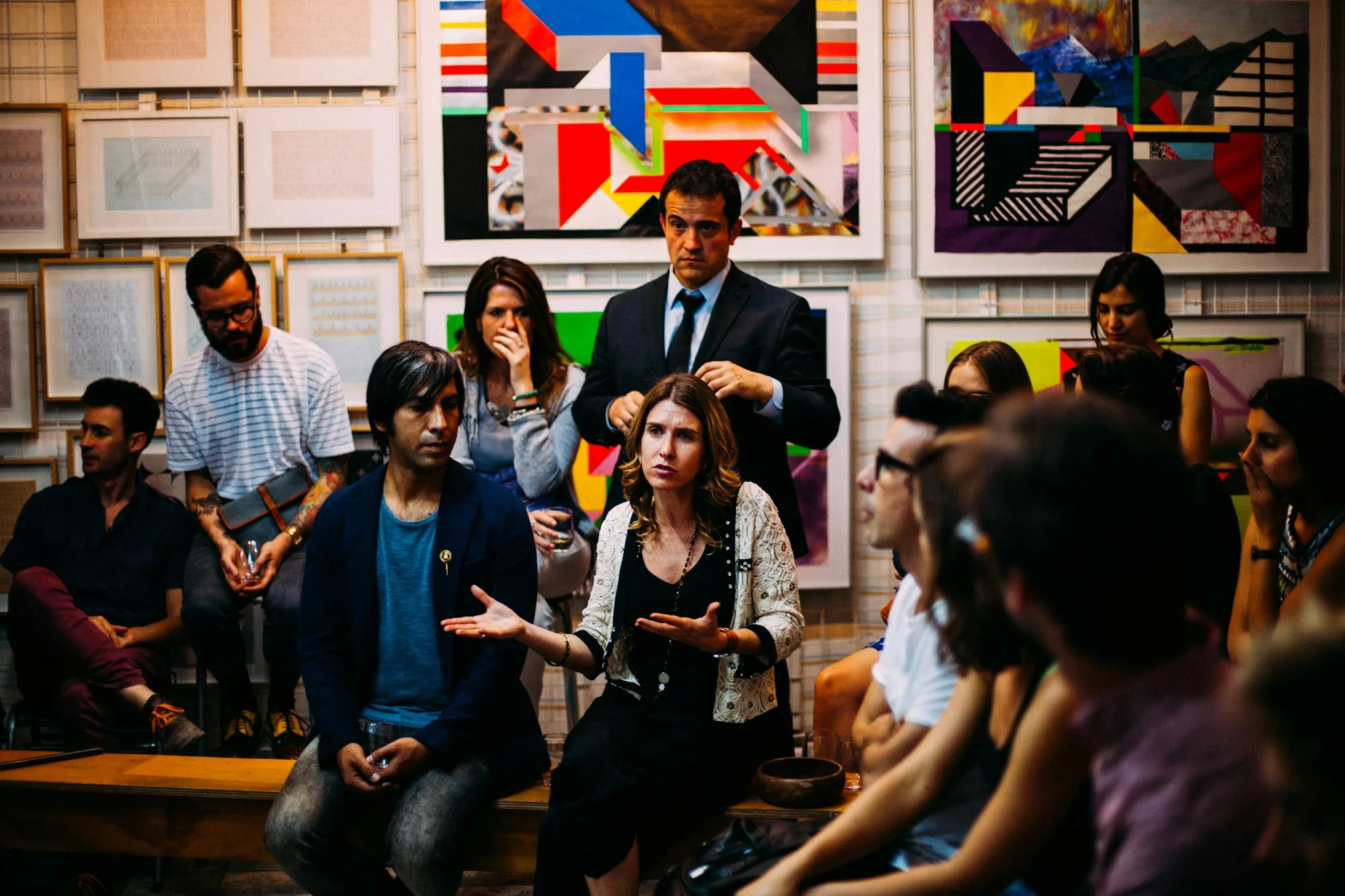 A diverse group of people in an open discussion during a community consultation